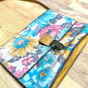 Preowned Crossbody bag by Patricia Nash. Style Lanza, color first bloom.